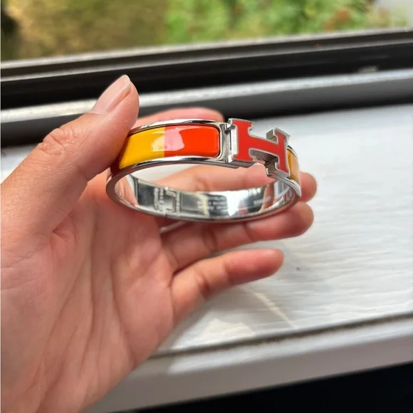 Brand new Hermès Orange and Yellow Enamel Bracelet limited Edition - Picture 1 of 8